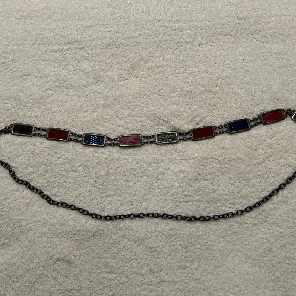 Chicos metal chain belt with black, blue and a burnt orange color enamel